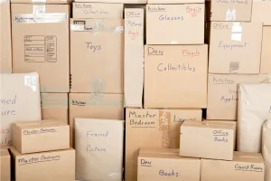 labeled boxes in the back of a moving truck